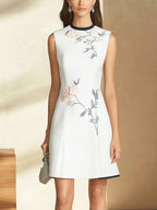 White Sleeveless Dress with Embroidered Floral Design
