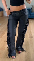 Low‐Rise Fringe Faux Leather Flare Pants