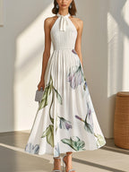 Floral Print Sleeveless Pleated Dress with Tie-Neck Detail