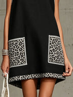 Black Sleeveless Mini Dress With Leopard Print Pockets and Trim