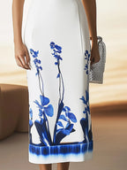 Sleek Sleeveless Satin Dress with Bold Blue Botanical Print