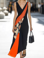 Black Satin Dress With Vibrant Orange And Floral Prints