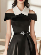 Modern Black Satin Dress with White Collar and Waist Adornment