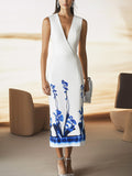 Sleek Sleeveless Satin Dress with Bold Blue Botanical Print
