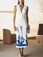 Sleek Sleeveless Satin Dress with Bold Blue Botanical Print