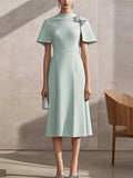 Chic Light Green Satin Cape-Sleeve Dress with Silver Shoulder Adornment