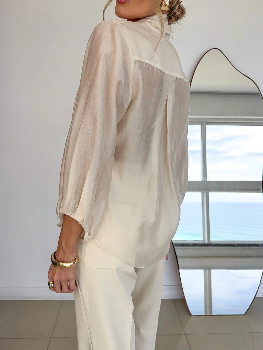 An Elegant And Cozy Shirt With Multiple Ways To Wear