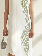 White Linen Dress with Green Embroidery Detail