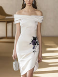 Chic White Satin Dress Featuring Asymmetric Hem and Floral Embroidery